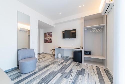 an office with a chair and a desk in a room at Fronte Etna in Bronte