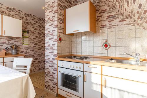 Kuchyň nebo kuchyňský kout v ubytování Gästehaus Ollech