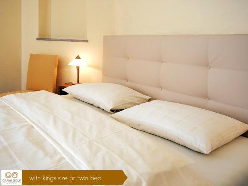 Cama o camas de una habitación en Hotel Garni Golf