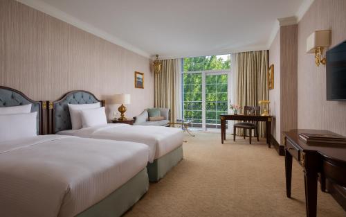 Кровать или кровати в номере Rixos Almaty Отель