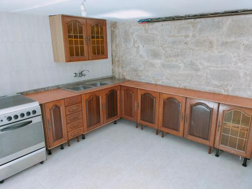 Kuchyňa alebo kuchynka v ubytovaní Casa das Mareas