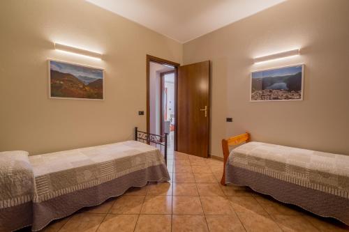 Posteľ alebo postele v izbe v ubytovaní Argegno Como Lake