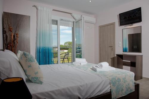 A bed or beds in a room at Studio Elena