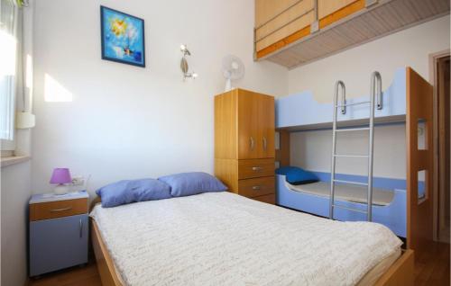 Voodi või voodid majutusasutuse 1 Bedroom Lovely Apartment In Medulin toas