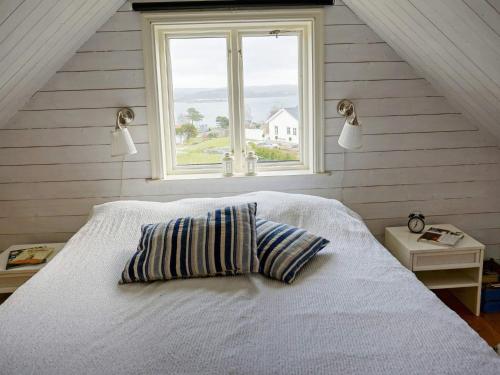 Postel nebo postele na pokoji v ubytování Holiday home Höviksnäs VI