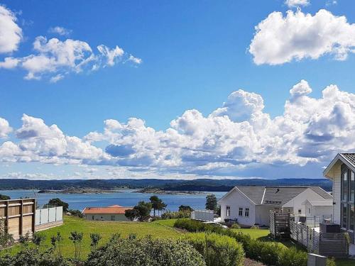 a house with a view of a body of water at 6 person holiday home in Höviksnäs-By Traum in Höviksnäs