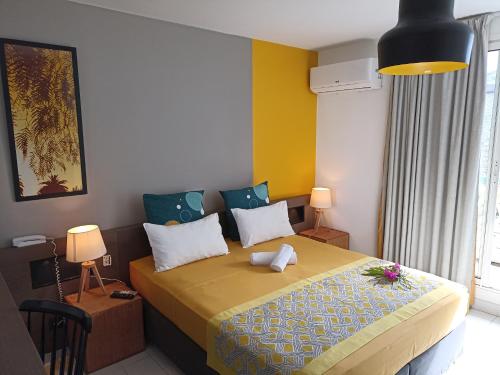 Llit o llits en una habitació de MANGANAO STUDIO