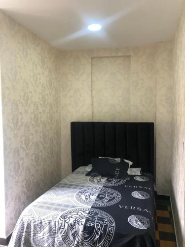 Postel nebo postele na pokoji v ubytování Habitación Independiente Zona Colonial