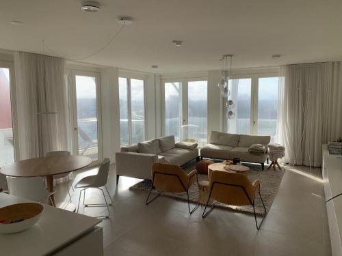Ruang duduk di Cadzand Dream Beach, Pool and Wellness Apartment