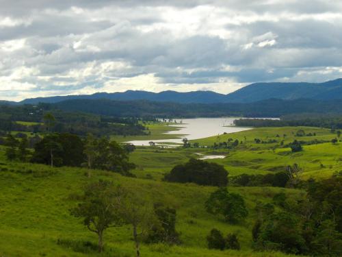 a view of a river in a green field at Tinaroo Sunset Retreat in Barrine