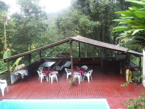 Taman di luar Chalés Lumiar - Casas temporada