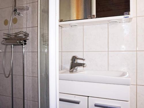 a bathroom with a sink and a shower at 4 person holiday home in Mörbylånga-By Traum in Mörbylånga