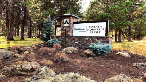 a sign for a mountain museum in a park at Seventh Mountain Resort in Bend