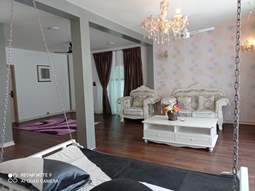 Posezení v ubytování Bougain Villa Gemanafushi
