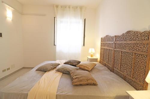 Ένα ή περισσότερα κρεβάτια σε δωμάτιο στο Casa Nero Davola Residence Torre Santo Stefano in Otranto
