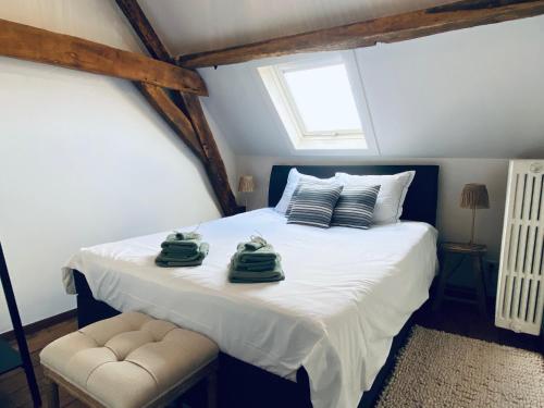 En eller flere senge i et værelse på ZEN op Vakantie - Zen in de Vlaamse Ardennen Sint Janshoeve