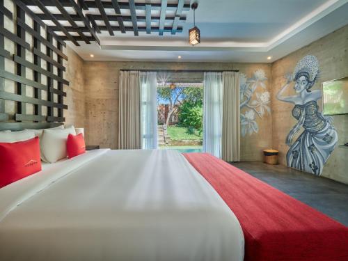 Łóżko lub łóżka w pokoju w obiekcie The Tempekan Heritage