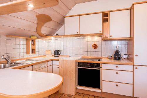 Η κουζίνα ή μικρή κουζίνα στο Apartment Vigl Lodge