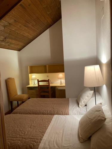 Llit o llits en una habitació de Ático Jaca a 200 m de la Ciudadela