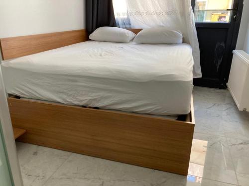 Postel nebo postele na pokoji v ubytování NR1 HOTEL