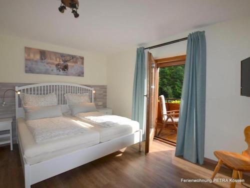 Postel nebo postele na pokoji v ubytování Ferienwohnung Petra