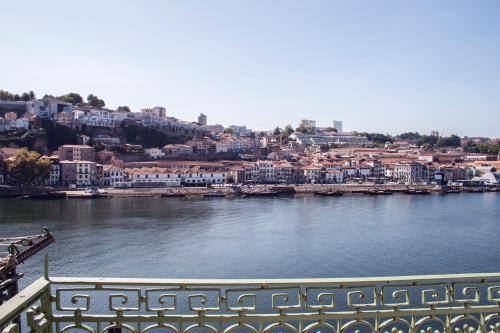 a view of a river with a city in the background at Panorama Apartments Ribeira Porto in Porto