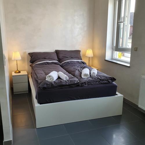 Letto o letti in una camera di Pension Bad Soden / Apartment and Rooms