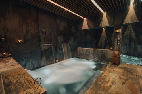 a pool of water in a room at Rafa Nadal Residence in Manacor