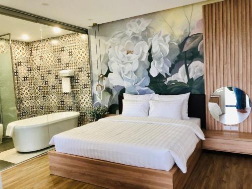 Giường trong phòng chung tại Rose Villa Venus Resort by Flamingo