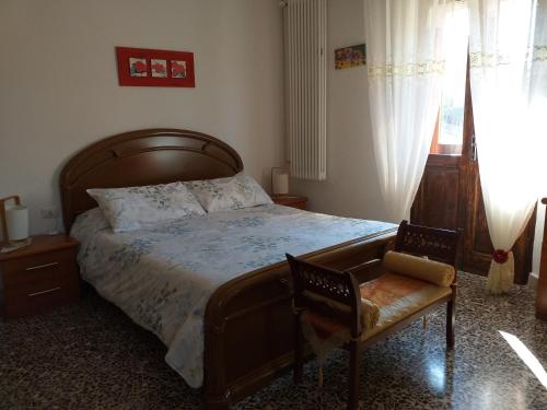 Ein Bett oder Betten in einem Zimmer der Unterkunft Bed & Breakfast La Rosa Rossa