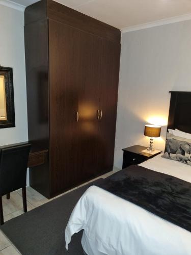 Ένα ή περισσότερα κρεβάτια σε δωμάτιο στο Sekelbos Guesthouse