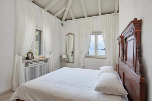 Ένα ή περισσότερα κρεβάτια σε δωμάτιο στο Mala kuća Sobra
