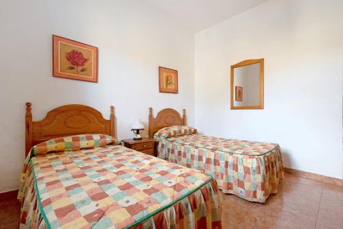 Ένα ή περισσότερα κρεβάτια σε δωμάτιο στο Casa El Cardon B1
