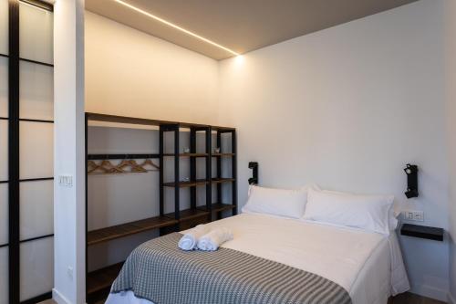 Кровать или кровати в номере PISO DE DISEÑO CON VISTAS A LA RIA.