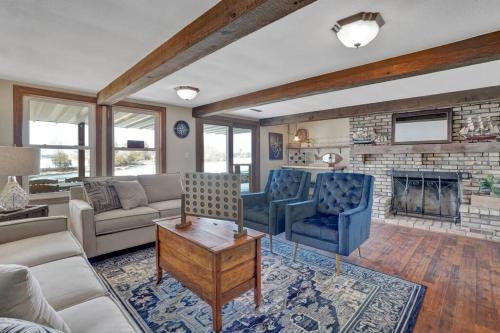a living room with a couch and a fireplace at Bayside Beach House in Burlington