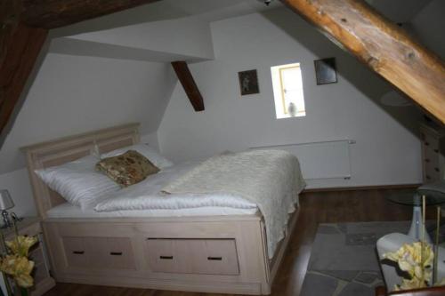 Ein Bett oder Betten in einem Zimmer der Unterkunft Lovecký Zámeček Šilheřovice