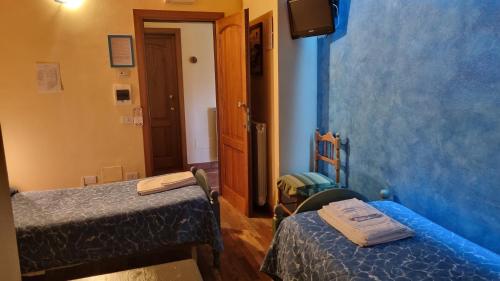 Ένα ή περισσότερα κρεβάτια σε δωμάτιο στο Agriturismo La Ginestra