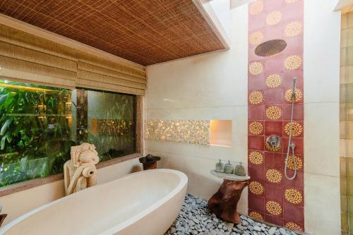 
A bathroom at The Udaya Resorts and Spa
