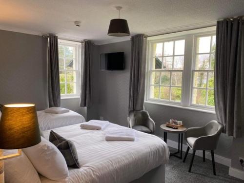 เตียงในห้องที่ Isle of Skye Guest House