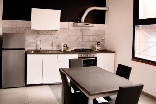 Kuchyňa alebo kuchynka v ubytovaní Casa della Lettera