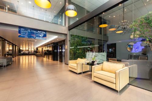 Posezení v ubytování Tri Hotel Executive Lajeado