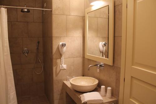 Ein Badezimmer in der Unterkunft Relais in Contrada