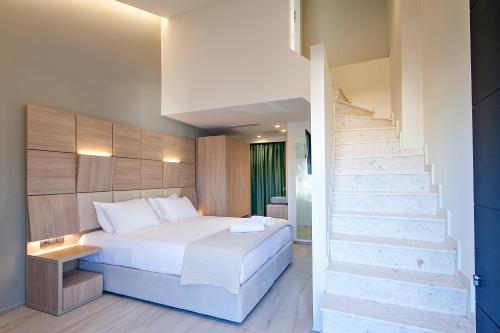 Postel nebo postele na pokoji v ubytování ALTHAEA LUXURY ROOMS