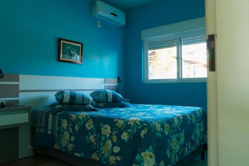 מיטה או מיטות בחדר ב-Pousada Praia da Villa