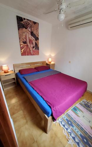 En eller flere senge i et værelse på Villa Rosa Ferienhaus Costa Blanca La Marina San Fulgencio Alicante