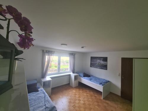 Postel nebo postele na pokoji v ubytování Monteurwohnung Uettinge