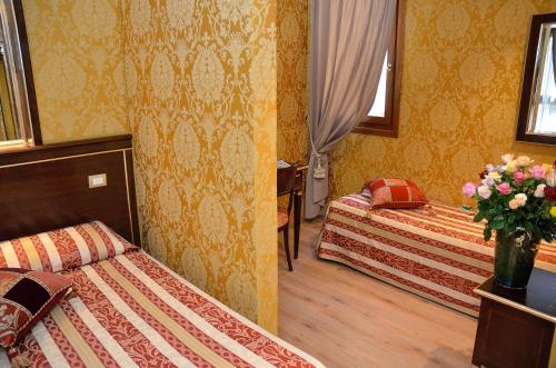 Cama o camas de una habitación en Residenza Goldoni