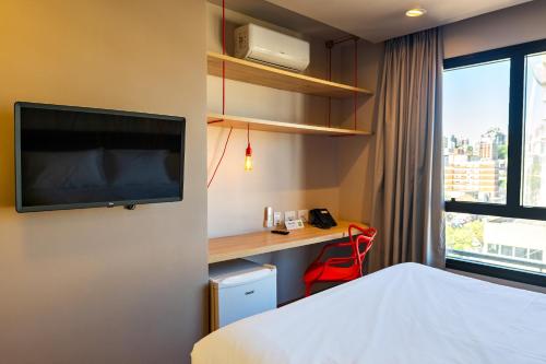 Voodi või voodid majutusasutuse ibis Styles Porto Alegre Moinhos de Vento toas