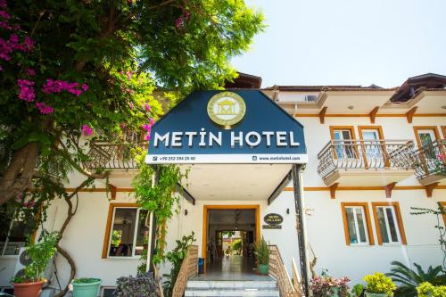 Certifikát, hodnocení, plakát nebo jiný dokument vystavený v ubytování Metin Hotel