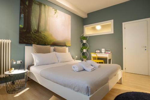 Un pat sau paturi într-o cameră la Rialto 13